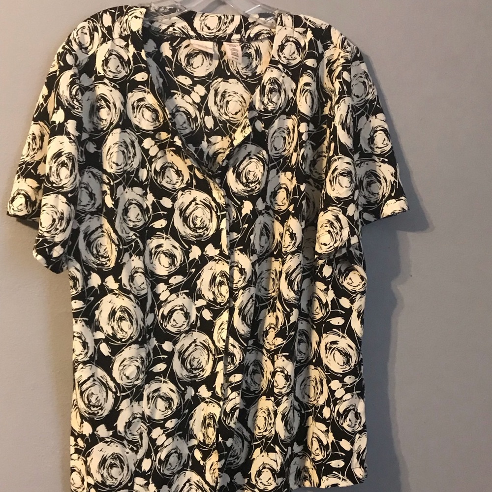 Button down blouse. Black w/ white design.